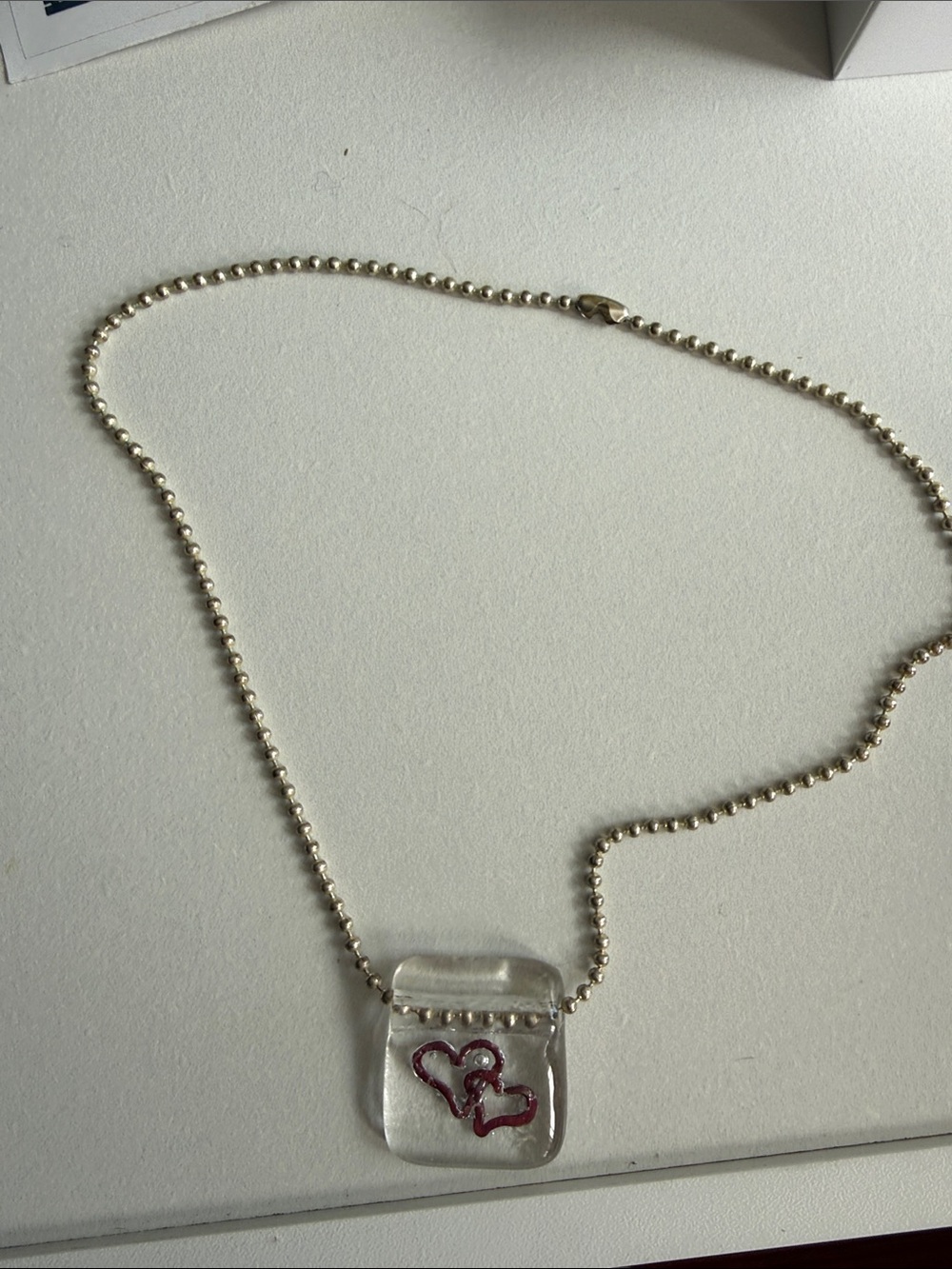 Silver Beaded Necklace with Clear Pendant and Pink Heart Accent